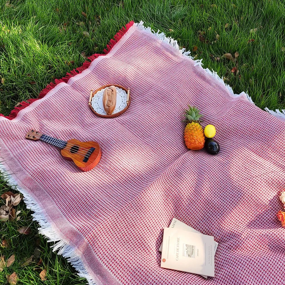 Lichtgewicht picknickkleed met decoratieve kwastjes
