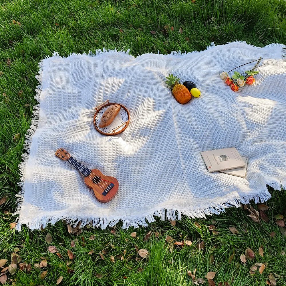 Lichtgewicht picknickkleed met decoratieve kwastjes