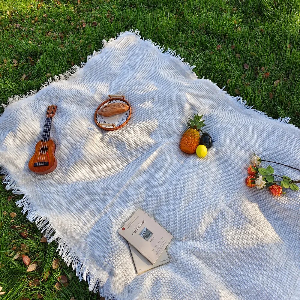 Lichtgewicht picknickkleed met decoratieve kwastjes