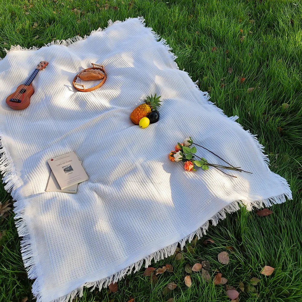 Lichtgewicht picknickkleed met decoratieve kwastjes