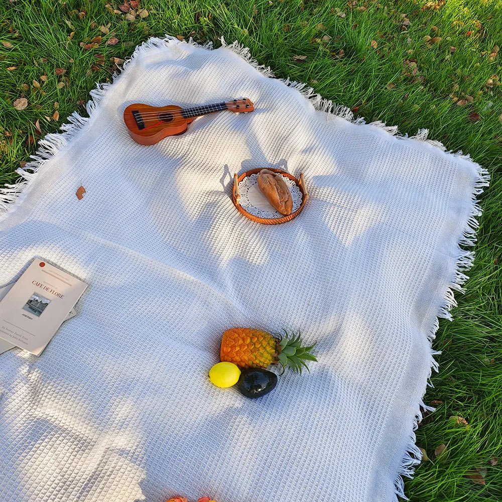 Lichtgewicht picknickkleed met decoratieve kwastjes