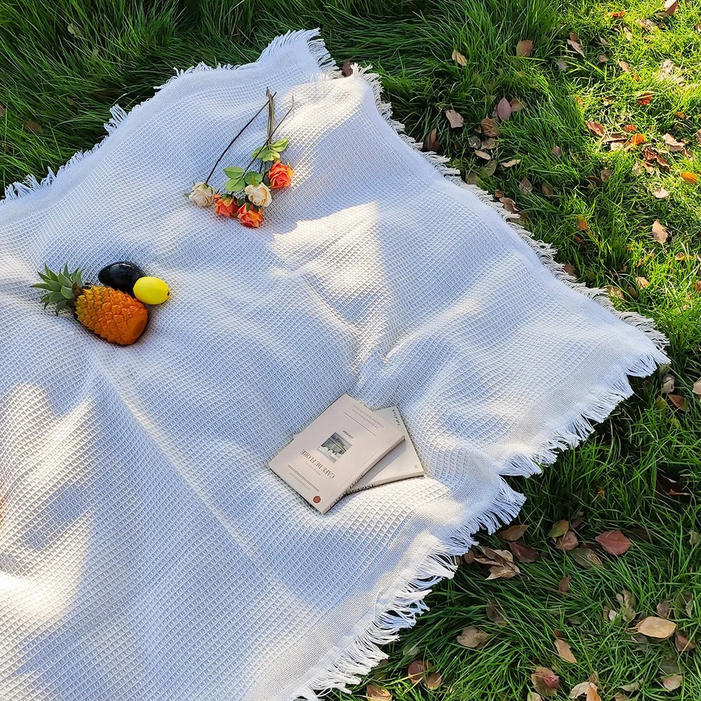 Lichtgewicht picknickkleed met decoratieve kwastjes