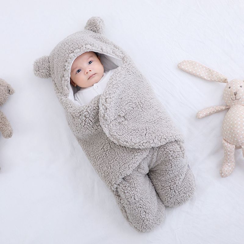 Ademende katoenen baby inbakerdoek met klittenband